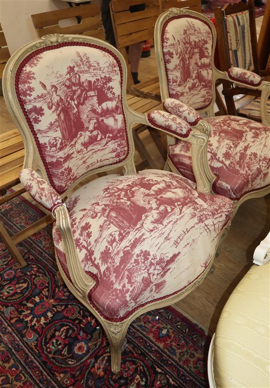 A pair of painted French fauteuils